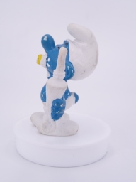 Schtroumpf avec brosse à dents et dentifrice - photo