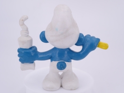 Schtroumpf avec brosse à dents et dentifrice - photo