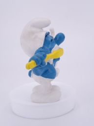 Schtroumpf avec brosse à dents et dentifrice - photo