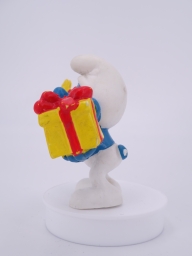 Schtroumpf avec cadeau et fleurs - photo