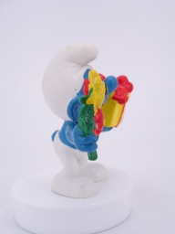 Schtroumpf avec cadeau et fleurs - photo