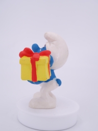 Schtroumpf avec cadeau et fleurs - photo