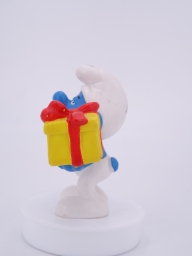 Schtroumpf avec cadeau et fleurs - photo