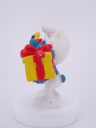 Schtroumpf avec cadeau et fleurs - photo