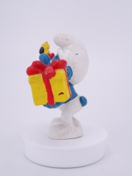 Schtroumpf avec cadeau et fleurs - photo