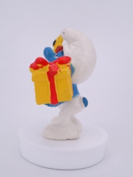 Schtroumpf avec cadeau et fleurs - photo