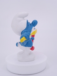 Schtroumpf avec brosse à dents et dentifrice - photo