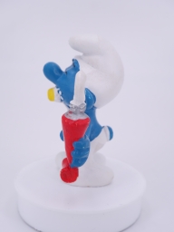 Schtroumpf avec brosse à dents et dentifrice - photo