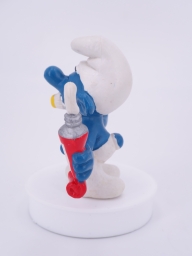 Schtroumpf avec brosse à dents et dentifrice - photo