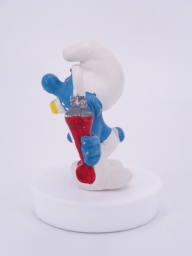 Schtroumpf avec brosse à dents et dentifrice - photo