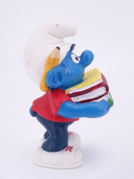 Schtroumpf étudiant avec pile de livres - photo