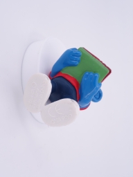 Schtroumpf étudiant avec pile de livres - photo