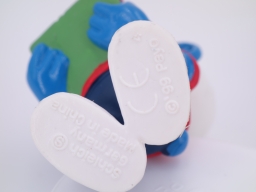 Schtroumpf étudiant avec pile de livres - photo