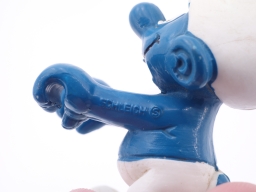 Schtroumpf avec tondeuse à gazon - photo