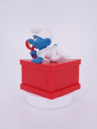 Bébé Schtroumpf avec hochet - photo