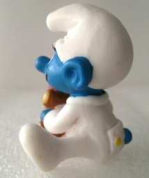Bébé Schtroumpf avec ourson en peluche - photo