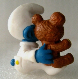 Bébé Schtroumpf avec ourson en peluche - photo