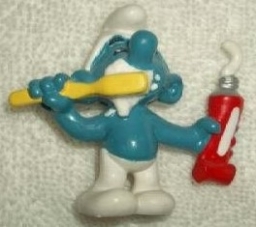 Schtroumpf avec brosse à dents et dentifrice - photo