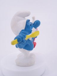 Schtroumpf avec brosse à dents et dentifrice - photo