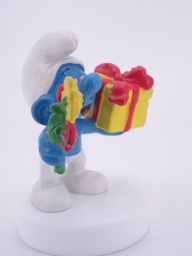 Schtroumpf avec cadeau et fleurs - photo