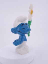 Schtroumpf courtisant avec fleur (rendez-vous) - photo