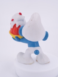 Schtroumpf gourmand avec gâteau - photo