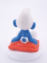 Schtroumpf assis sur un coussin - photo