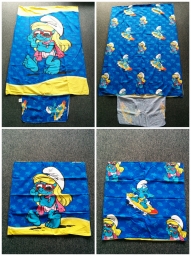 Housse de couette & taie d'oreiller Schtroumpf surfeur & Schtroumpfette à la plage