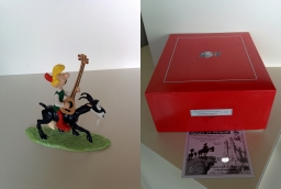 3800 - Pirlouit jouant de la guitare à cheval sur Biquette