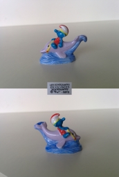 Schtroumpf sur un dauphin