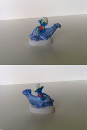 Schtroumpf sur un dauphin