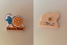Pin's Minute Maid - Schtroumpf avec une orange