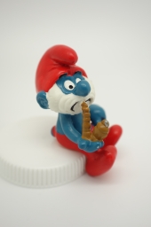 Grand Schtroumpf avec pipe et chaise