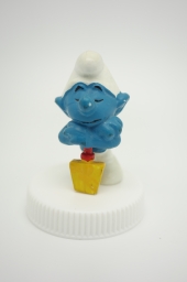 Schtroumpf endormi sur sa pelle (petit)