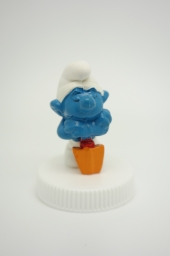 Schtroumpf endormi sur sa pelle (petit)