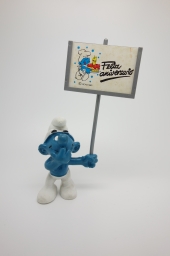 Schtroumpf avec pancarte