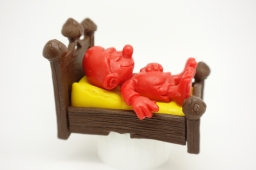 Schtroumpf dormeur dans son lit