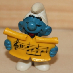 Schtroumpf chanteur avec partition