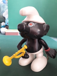 Tirelire Schtroumpf noir avec flûte