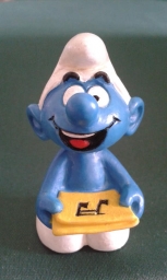 Schtroumpf chanteur avec partition