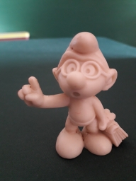 Schtroumpf à lunettes avec livre