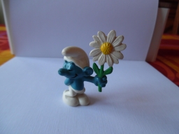 Schtroumpf courtisant avec fleur (rendez-vous)