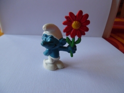 Schtroumpf courtisant avec fleur (rendez-vous)