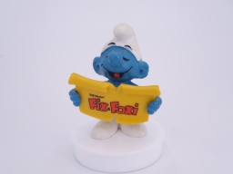 Schtroumpf chanteur avec partition