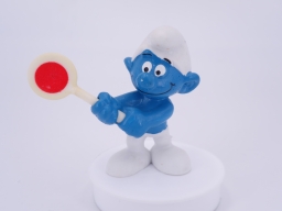 Schtroumpf avec panneau de traffic