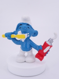 Schtroumpf avec brosse à dents et dentifrice