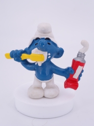 Schtroumpf avec brosse à dents et dentifrice