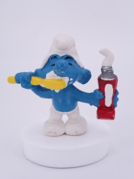 Schtroumpf avec brosse à dents et dentifrice