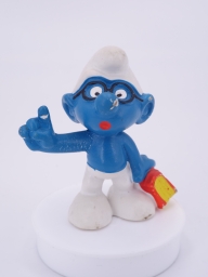 Schtroumpf à lunettes avec livre
