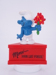 Schtroumpf amoureux avec fleurs